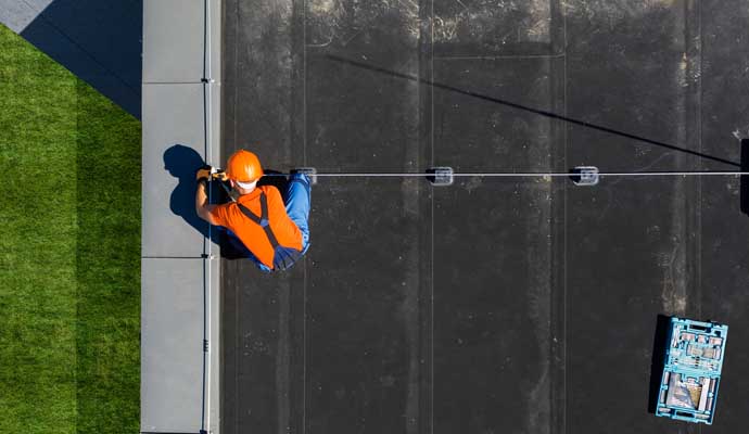 Professional installing roof components