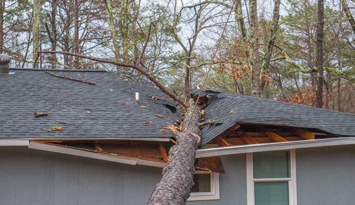 House with storm damaged roof