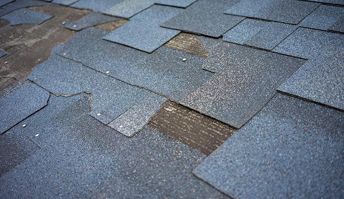 Roof with visible missing shingles