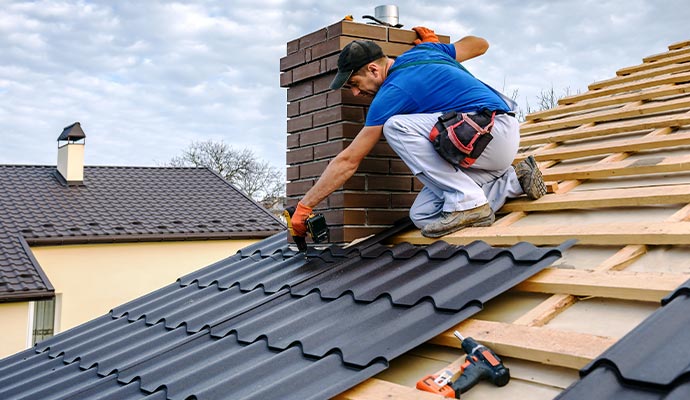 Professional installing a new roof