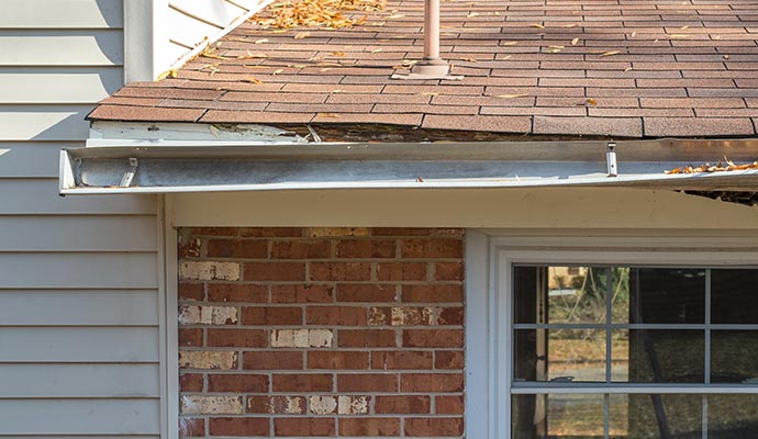 Roof and  gutter damaged after storm